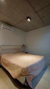 Ένα ή περισσότερα κρεβάτια σε δωμάτιο στο Aurora