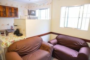 Køkken eller tekøkken på Apartamentos Incríveis Primeira Quadra Mar WiFi