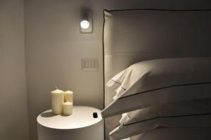 Posteľ alebo postele v izbe v ubytovaní Luxury 2 Apartments Cervia with Swimming Pool