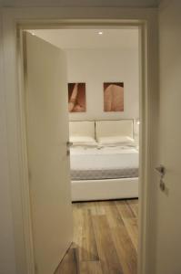 Posteľ alebo postele v izbe v ubytovaní Luxury 2 Apartments Cervia with Swimming Pool