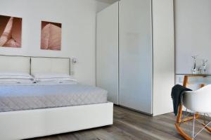 Posteľ alebo postele v izbe v ubytovaní Luxury 2 Apartments Cervia with Swimming Pool