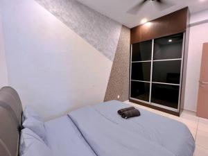 เตียงในห้องที่ Comfy & Cozy D'Sara Sentral @ Direct Linked MRT, Near Thomson & Sungai Buloh Hospital