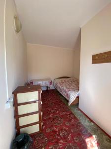Postel nebo postele na pokoji v ubytování Guest House Regina