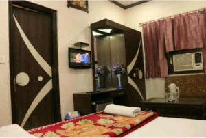 TV tai viihdekeskus majoituspaikassa Hotel Maharaja Continental - New Delhi