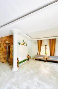 Postel nebo postele na pokoji v ubytování Laluna Guesthouse