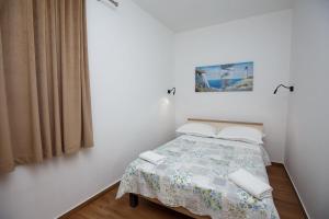 Ένα ή περισσότερα κρεβάτια σε δωμάτιο στο Villa MiEma with Jacuzzi +7 φωτογραφίες