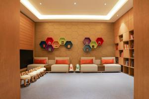 Uma área de estar em KARE HOTELS RESIDENCES Qianhai Shenzhen