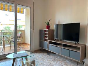 Televízia a/alebo spoločenská miestnosť v ubytovaní Marina Sol - CABO ROIG