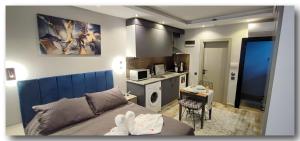 Kuchyň nebo kuchyňský kout v ubytování Aspendos Suites Konyaaltı Apart