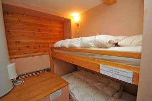 Postel nebo postele na pokoji v ubytování Appartement 10 couchages face à la meije