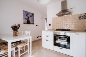 A kitchen or kitchenette at Case vacanze in graziosa borgata alpina