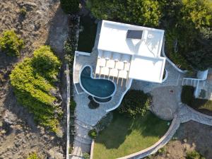 The swimming pool at or close to Seafront Villa Polyxene