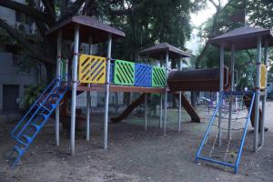 a group of playground equipment in a park at Fortune Home Service Apartment 3Bhk,B-57 Sarita Vihar in New Delhi