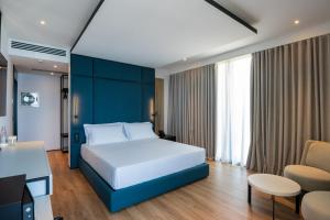 Postel nebo postele na pokoji v ubytování Mango Luxury Resorts + 31 fotografií