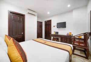 Televiisor ja/või meelelahutuskeskus majutusasutuses Hoa Phong Airport Danang Hotel