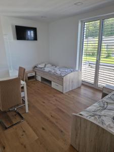 Postelja oz. postelje v sobi nastanitve Cona rooms