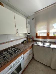 Kuchyň nebo kuchyňský kout v ubytování Casa de playa