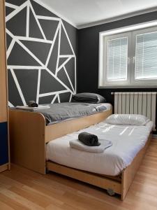 Tempat tidur dalam kamar di Villa Dalia
