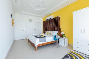 Giường trong phòng chung tại Palm Villa 22 - Ocean View 3bedrooms