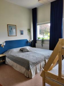 Postel nebo postele na pokoji v ubytování KG SleepOver & Ställplats