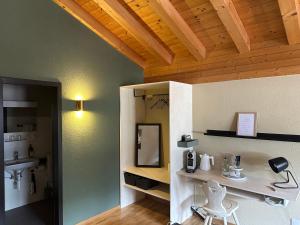 Kuchyň nebo kuchyňský kout v ubytování Pez Regina - Nordic Style Alps Hotel