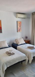 Ένα ή περισσότερα κρεβάτια σε δωμάτιο στο Mijas Golf