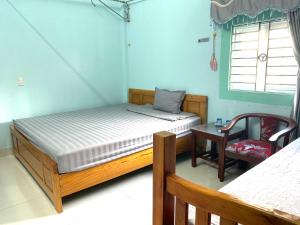 Postel nebo postele na pokoji v ubytování Lam Giang Homestay Dong Van