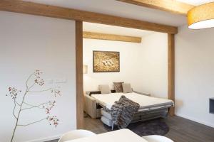 Postel nebo postele na pokoji v ubytování Equitana Hotel Resort + 37 fotografií