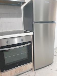 Kuchyňa alebo kuchynka v ubytovaní Garden Lefkanti, 4season Plaza Room