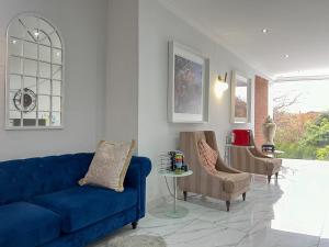 Amoris Guesthouse - In Randburg的休息区