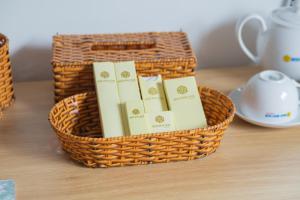 two baskets sitting on top of a table at Minh Minh Nam 2 Hotel in Can Tho
