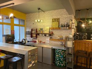 A kitchen or kitchenette at Hive Bed and Backpacker蜂巢膠囊旅店