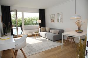 Posezení v ubytování Apartment Am Teich