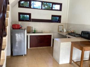 Kuchyň nebo kuchyňský kout v ubytování Balian Seaview Surf Villas