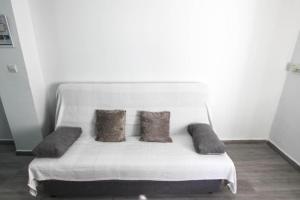 Posteľ alebo postele v izbe v ubytovaní Estudio Jimena Burriana en el centro de Nerja