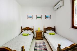 Postel nebo postele na pokoji v ubytování Villa Dionis