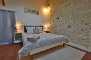 Postel nebo postele na pokoji v ubytování Chambre d'hôtes L'altitude - Domaine la Rose des vents