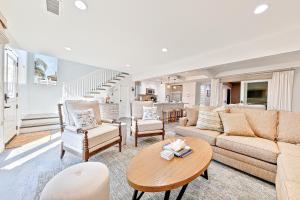 a living room with a couch and a table at Balboa Island Diamond Resort Compound in Newport Beach