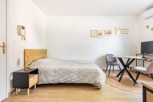 Posteľ alebo postele v izbe v ubytovaní Le Forbin : Studio standing Centre Aix avec Clim