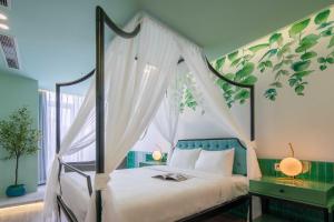 Ένα ή περισσότερα κρεβάτια σε δωμάτιο στο Jacayl Hotel TCG