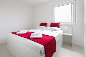 Postel nebo postele na pokoji v ubytování Residences Bellavista 3