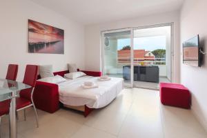 Postel nebo postele na pokoji v ubytování Residences Bellavista 3