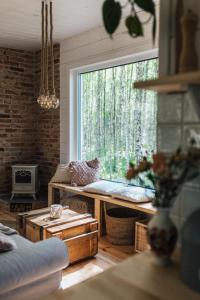 Χώρος καθιστικού στο Domek w drzewach w Siedlisku Polanka