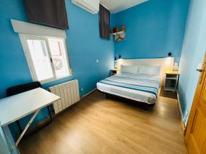 Ένα ή περισσότερα κρεβάτια σε δωμάτιο στο CH Casillas