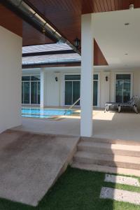 Bazén v ubytování Hua Hin, Pool Villa, Nice Breeze 7 nebo v jeho okolí + 2 fotografie