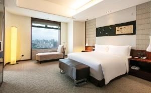 Postel nebo postele na pokoji v ubytování InterContinental Foshan by IHG