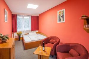 Postel nebo postele na pokoji v ubytování Hotel Gól garni