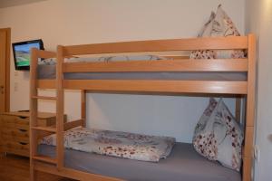 A bed or beds in a room at Appartement Wieshof