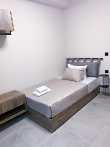 Postel nebo postele na pokoji v ubytování Nostos luxury beach home