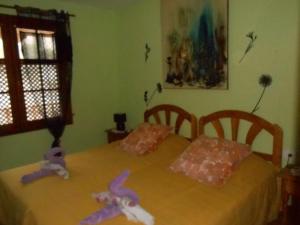 サンティアゴ・デル・テイデにあるBELLE VUE sur les FALAISESの人形2人部屋のベッド2台